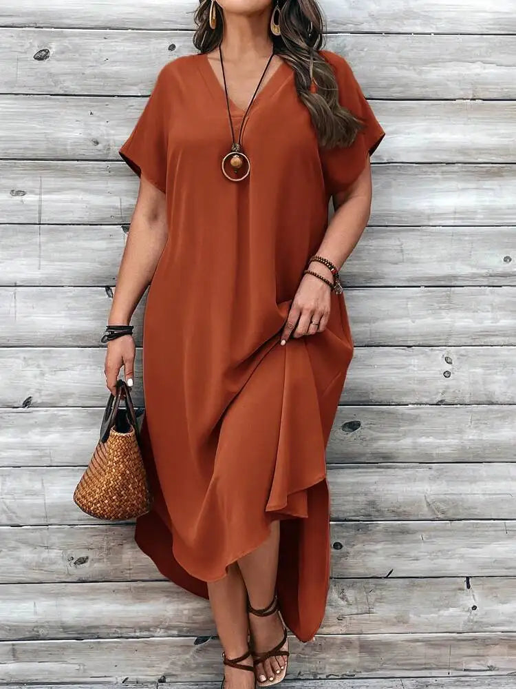 Elegant plus size women's casual V-neck dress for spring and summer.
