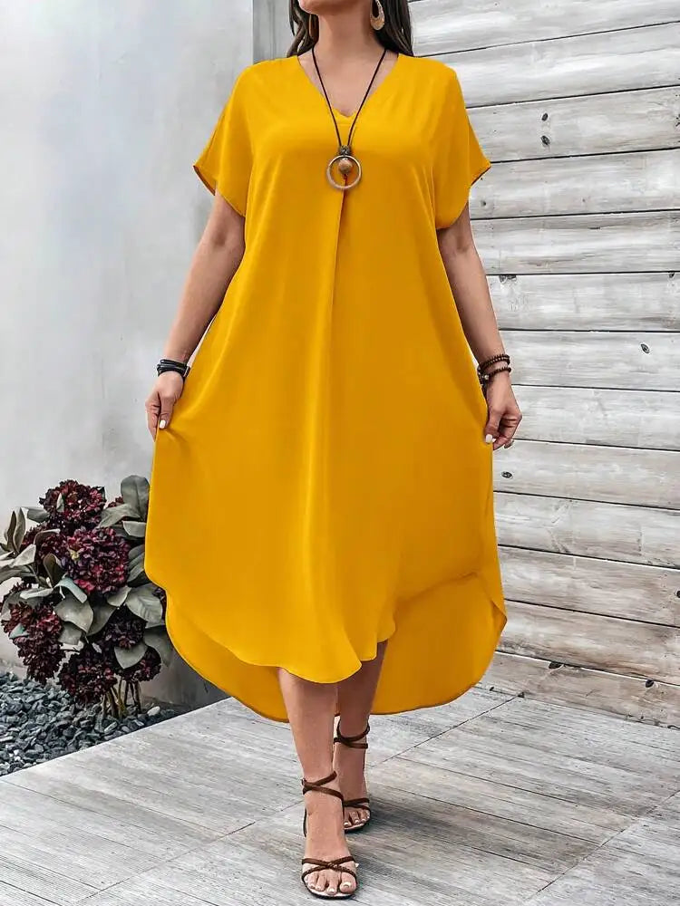 Elegant plus size women's casual V-neck dress for spring and summer.